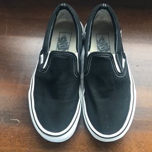 Black slip-on Vans